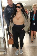 Pregnant KIM KARDASHIAN Arrives at Airport in Nice 06/23/2015