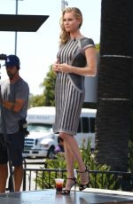 REBECCA ROMIJN on the Set of Extra in Universal City