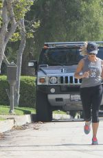 REESE WITHERSPOON and Jim Toth Out Jogging in Los Angeles 06/21/2015