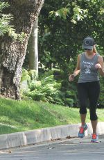 REESE WITHERSPOON and Jim Toth Out Jogging in Los Angeles 06/21/2015
