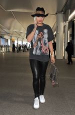 RITA ORA Arrives at Heathrow Airport in London 06/02/2015