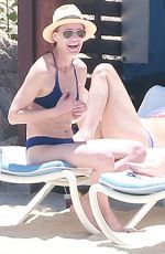 ROBIN WRIGHT and DYLAN PENN in Bikinis at a Beach in Mexico 05/29/2015