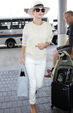 ROSIE HUNTINGTON-WHITELEY Arrives at LAX Airport in Los Angeles 06/28/2015