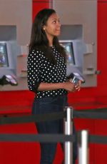 ZOE SALDANA Arrives at a Movie Theatre in Vancouver 06/21/2015
