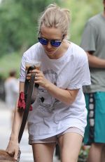 AMANDA SEYFRIED and Her Dog Finn Out in New York 07/30/2015