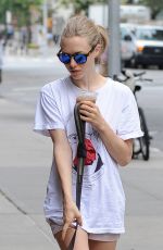 AMANDA SEYFRIED and Her Dog Finn Out in New York 07/30/2015