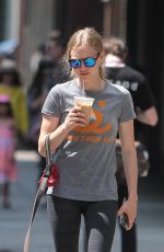 AMANDA SEYFRIED Walks Her Dog Out in New York 07/28/2015