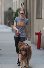 AMANDA SEYFRIED Walks Her Dog Out in New York 07/28/2015