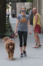 AMANDA SEYFRIED Walks Her Dog Out in New York 07/28/2015