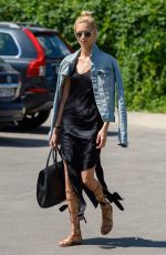 ANJA RUBIK on the Set of Catwalk Strut to the City Streets in Warsaw