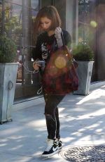 BRENDA SONG Out and About in West Hollywood 07/29/2015