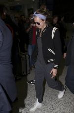 CARA DELEVIGNE at Airport in Sydney 07/04/2015