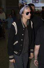 CARA DELEVIGNE at Airport in Sydney 07/04/2015
