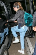 CARA DELEVINGNE in Jeans at LAX Airport inLos Angeles 07/07/2015