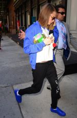 CARA DELEVINGNE Out and About in Soho 07/21/2015