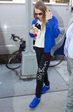 CARA DELEVINGNE Out and About in Soho 07/21/2015