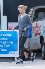 CHARLIZE THERON at Arco Gas Station in Los Angeles