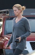 CHARLIZE THERON at Arco Gas Station in Los Angeles