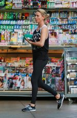 CHARLIZE THERON at Arco Gas Station in Los Angeles