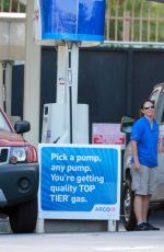 CHARLIZE THERON at Arco Gas Station in Los Angeles