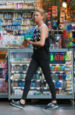 CHARLIZE THERON at Arco Gas Station in Los Angeles