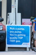 CHARLIZE THERON at Arco Gas Station in Los Angeles