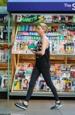 CHARLIZE THERON at Arco Gas Station in Los Angeles