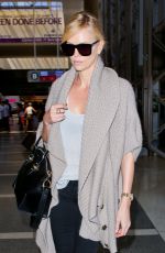 CHARLIZE THERON at Los Angeles International Airport 07/12/2015