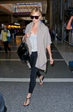 CHARLIZE THERON at Los Angeles International Airport 07/12/2015