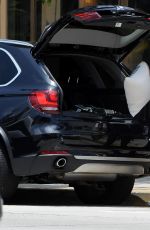 CHARLIZE THERON Out Shopping in Los Angeles 07/23/2015