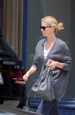 CHARLIZE THERON Out Shopping in Los Angeles 07/23/2015