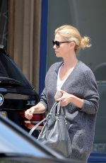 CHARLIZE THERON Out Shopping in Los Angeles 07/23/2015