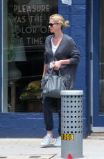 CHARLIZE THERON Out Shopping in Los Angeles 07/23/2015