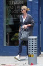 CHARLIZE THERON Out Shopping in Los Angeles 07/23/2015