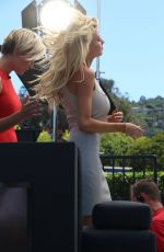 CHARLOTTE MCKINNEY on the Set of Extra in Universal City