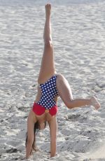 CLAUDIA ROMANI in Bikini Out on the Beach in Miami 07/02/2015