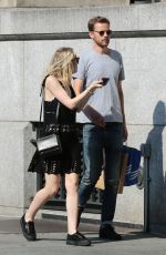 DAKOTA FANNING and Jamie Strachan Out and About in New York 07/25/2015