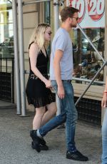 DAKOTA FANNING and Jamie Strachan Out and About in New York 07/25/2015