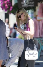 ELLE FANNING in Sports Bra Out in Los Angeles 07/03/2015