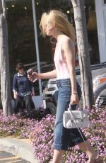 ELLE FANNING Leaves Farmer