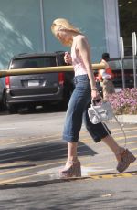ELLE FANNING Leaves Farmer