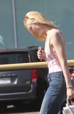 ELLE FANNING Leaves Farmer