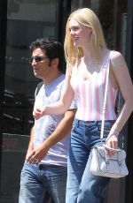 ELLE FANNING Out and About in Hollywood 07/27/2015