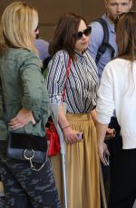 EMILIA CLARKE at LAX Airport in Los Angeles 06/30/2015
