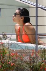 EVA LONGORIA in Bikini at a Pool at Her Hotel in Miami 06/30/2015