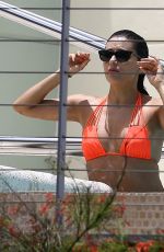 EVA LONGORIA in Bikini at a Pool at Her Hotel in Miami 06/30/2015