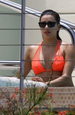 EVA LONGORIA in Bikini at a Pool at Her Hotel in Miami 06/30/2015