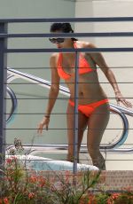 EVA LONGORIA in Bikini at a Pool at Her Hotel in Miami 06/30/2015