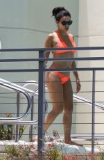 EVA LONGORIA in Bikini at a Pool at Her Hotel in Miami 06/30/2015