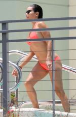 EVA LONGORIA in Bikini at a Pool at Her Hotel in Miami 06/30/2015